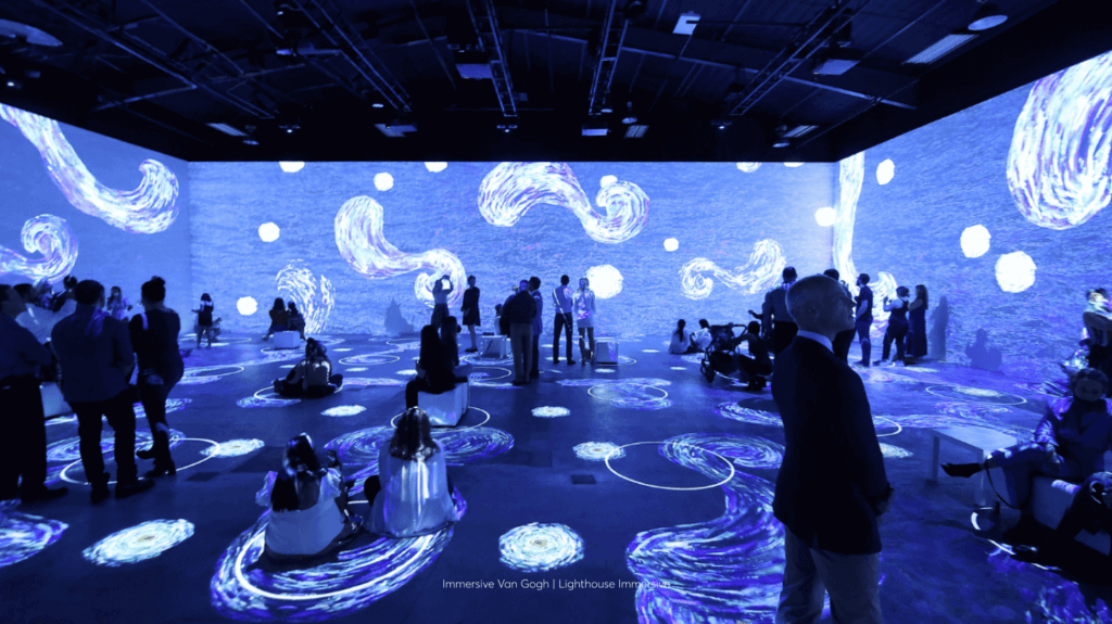 people surrounded by van Gough imagery