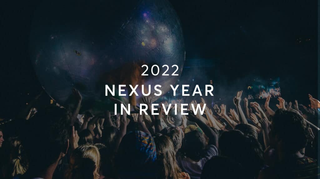 people celebrating with fireworks and 2022 nexus year in review over it